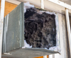 air duct filled with dust and dirt
